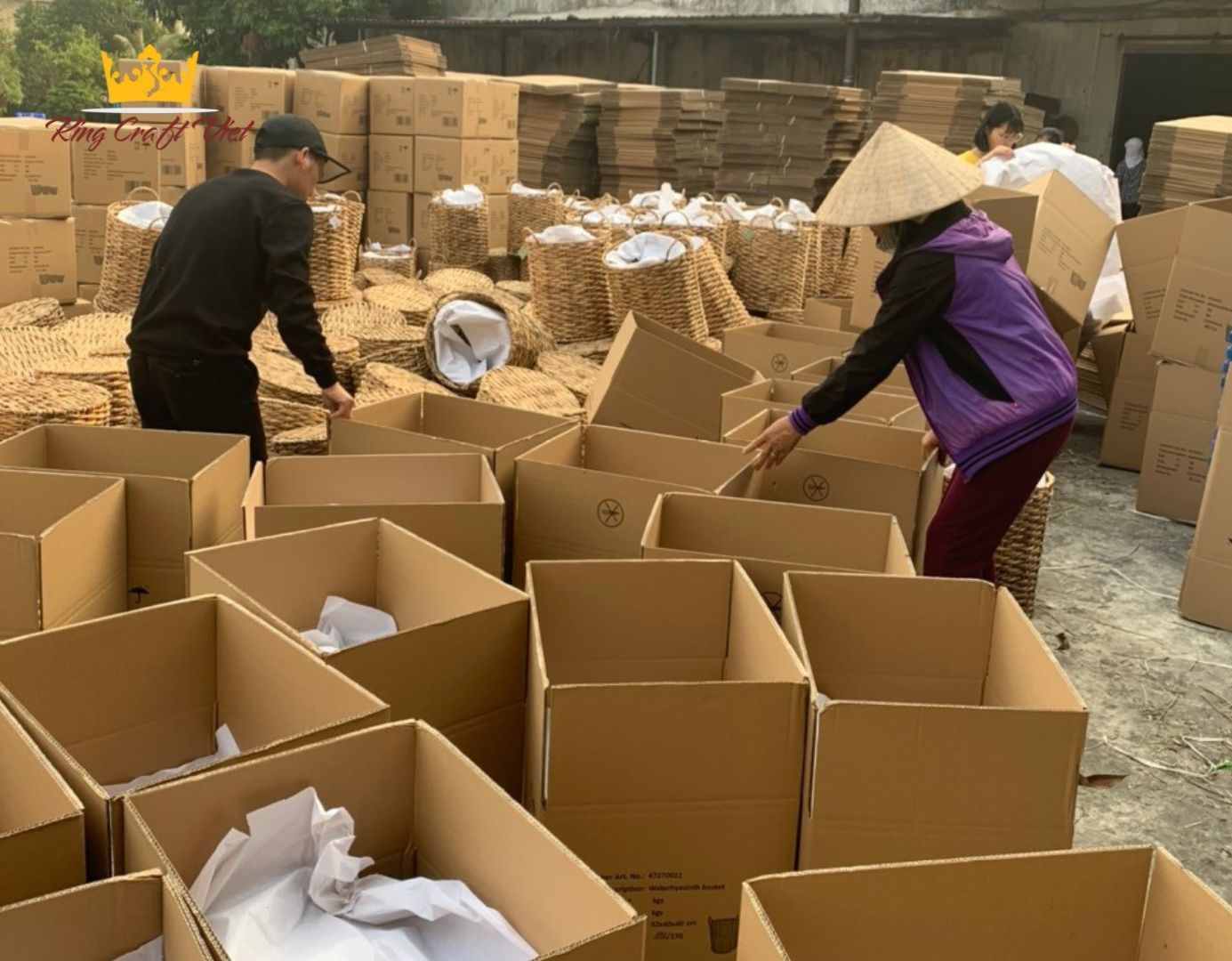 Image of a group of village craftsmen working in a bright atmosphere.