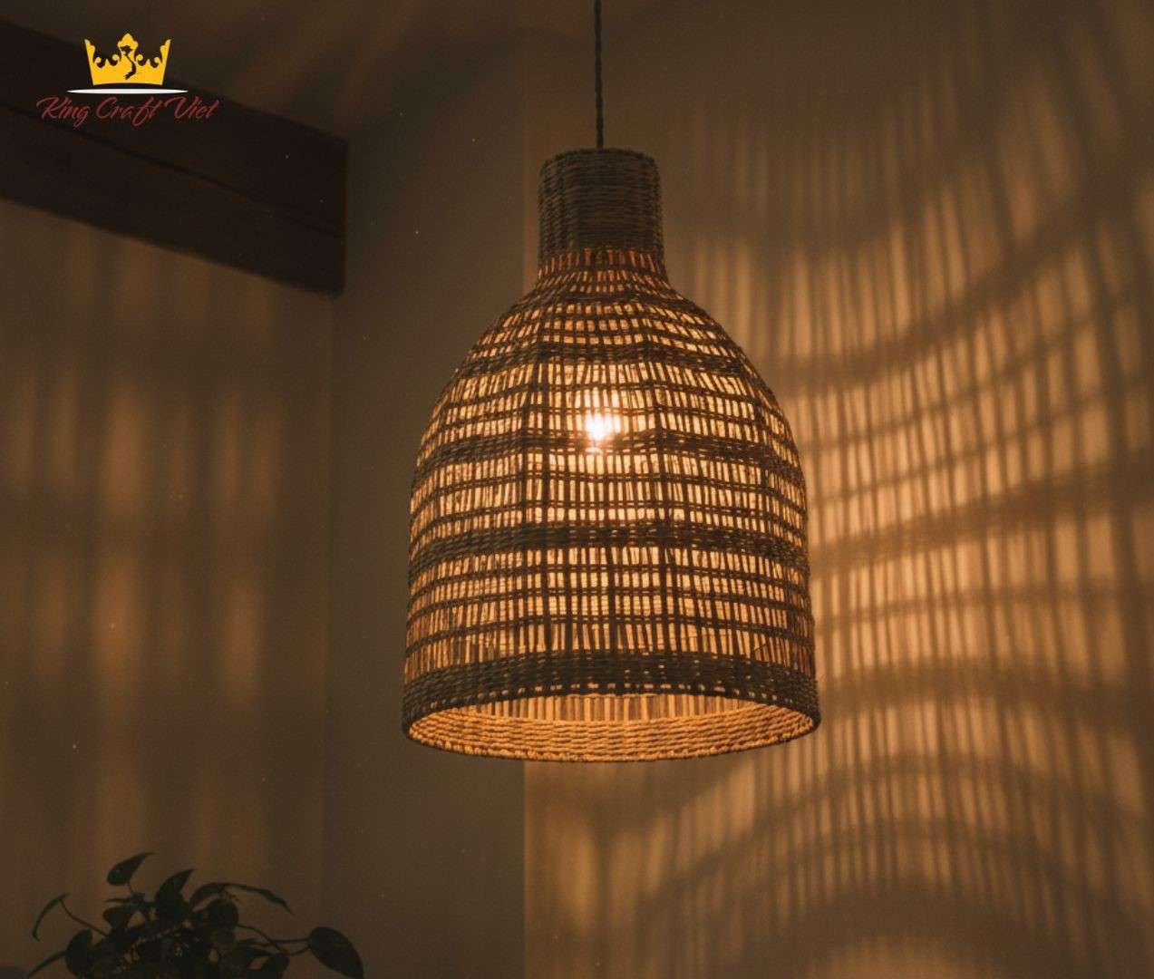 Warm glowing seagrass lampshade bringing natural beauty to modern home